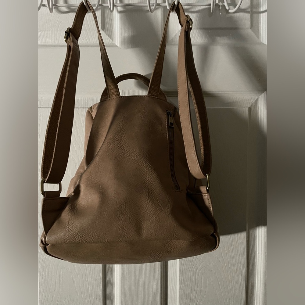 Joy Susan Backpack 
Like NEW !!!
Top 12” W11”D7”Drop 22”
Zip&Slip pockets 
EUC - Picture 3 of 8